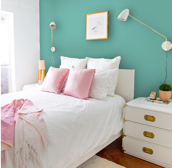 Create colorful contrast behind your bed to help brighten your room and add your own personal style for an updated look.