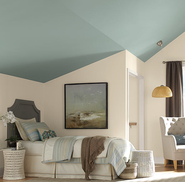 Pick up a subtle hue from your accessories in the room and turn your bedroom ceiling into a stunning accent wall.