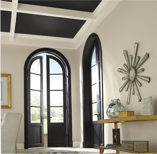 If your ceiling features exposed beams, paint them in a light color while using a darker shade on the interior segments to emphasize the detail.