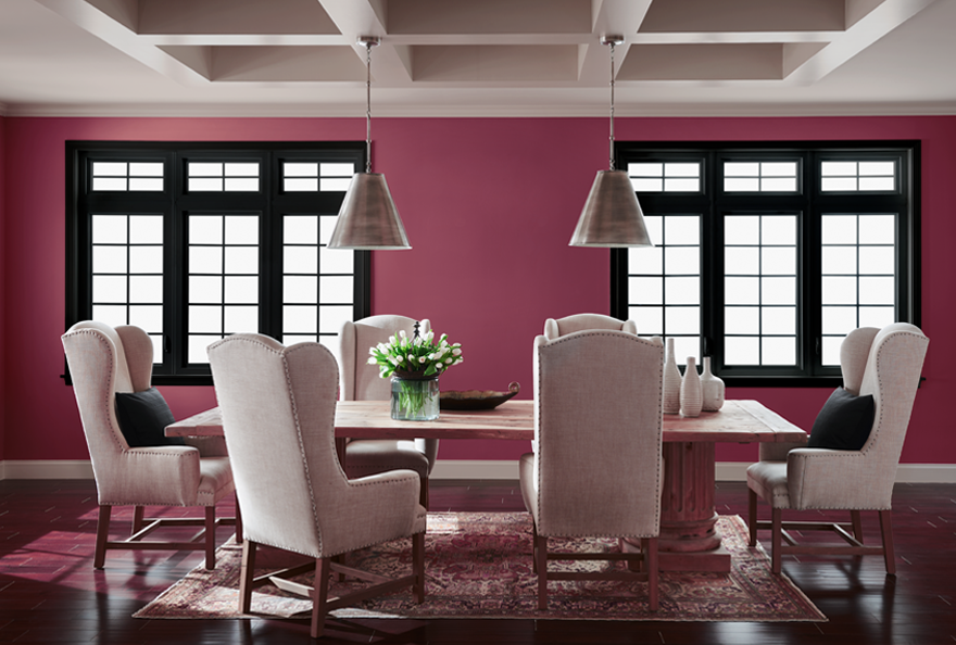 A dining room painted in Juneberry.